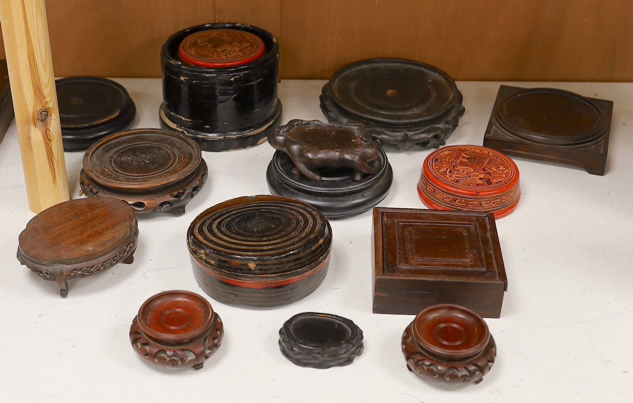 A group of Chinese and Oriental wood stands and a box